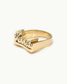 Spell it out in solid gold. While nameplates have no singular origin, much of the nameplate jewelry you see today stems from the iconic Fulton Street in Brooklyn during the 80s and 90s. Today, we pay homage to this legacy with a modern approach and bold, spirited design which we are honored + excited to share. This ring is made in 14k gold and is intentionally designed completely solid (no hollow rings here). With each ring weighing in around 9-12 grams, they boast a distinctive weight you can f Modern Gold Signet Promise Ring, Personalized Engraved Yellow Gold Ring For Collectors, Modern Gold Jewelry For Collectors, Modern Gold Collectible Jewelry, Modern Jewelry With Hallmarks For Anniversary, Modern 14k Gold Engraved Ring For Anniversary, Modern 14k Gold Collectible Jewelry, Retro 14k Gold Ring As Gift, Retro 14k Gold Rings As Gift