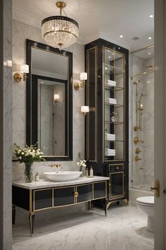 an elegant bathroom with black and gold accents