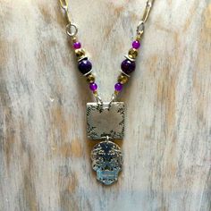 Sugar Skull Necklace Purple Agate And Bronze Glass Beads. Sugar Skull And Metal Plate Are Metal Alloy. Set On A Stainless Steel Paper Clip Chain With A Lobster Claw Clasp. Measures 18” In Length. Cute For Halloween Item Ready To Ship 15% Discount For 2 Or More Items Smoke Free Home All Reasonable Offers Welcome Silver Beaded Necklace For Healing, Bohemian Sterling Silver Beaded Chain Necklace, Silver Beaded Necklaces With Natural Stones, Nickel-free Sterling Silver Beaded Necklaces, Silver Beaded Necklaces With Natural Stones For Jewelry Making, Silver Beaded Pendant Necklace With Lobster Clasp, Nickel-free Sterling Silver Beaded Necklace, Silver Beaded Necklace With Natural Stone Pendant, Silver Beaded Necklace With Natural Stones For Jewelry Making