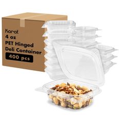 plastic food containers with lids are stacked on top of each other in front of a cardboard box