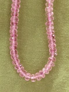 Natural Pink Morganite Faceted beads Rondelle Sharp Pink color 5 mm Faceted Morganite Beaded Necklace Morganite Loose Beads NATURAL PINK MORGANITE Here we offering a 2 line Necklace or Single Line Necklace or Loose Strands.we will avail as your needs. Shape : Faceted Round Beads Stone Weight : 180 - 190 carats (2 Line Necklace) 90 - 95 carats (1 Line Necklace) Gemstone Size : approx 5 - 6 mm Strand Size : 16 - 17 inches (2 Line Necklace) 16 inches (Single Line) Color : Sharp Pink with Fine Luste Pink Rondelle Jewelry With Polished Beads, Pink Rondelle Polished Beads Jewelry, Pink Polished Rondelle Beads Jewelry, Pink Faceted Round Beaded Necklaces, Pink Faceted Round Bead Necklaces, Pink Oval Faceted Beads Jewelry, Pink Faceted Oval Beads Jewelry, Pink Faceted Beads Gems And Cabochons For Gifts, Faceted Pink Beaded Necklaces