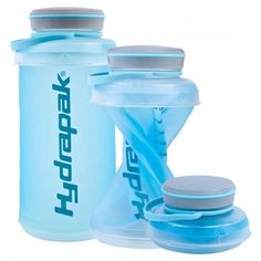 two water bottles with lids are next to each other