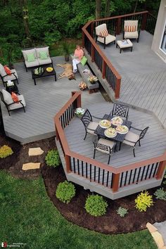 a deck with chairs and tables on it