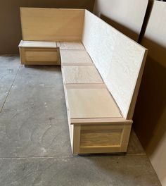 two wooden benches sitting next to each other