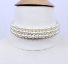 "This beautiful and classic pearl choker is made of 3 strands of high quality ivory glass pearls! The size of the largest pearls is 8mm. This style requires an accurate measurement of your neck circumference if you would like the necklace to wear close around your neck. If the length you would like is not listed, please let us know and we will knot the necklace according the length you provided. If it's a gift, we can do it in the common length of 13.5\" with a 2.5\" extender.   Choker comes wit Glam Jewelry, Chunky Pearls, Expensive Jewelry Luxury, Pearl Choker Necklace, Expensive Jewelry, Black Choker, Jewelry Choker, Pearl Choker, Bridal Pearls