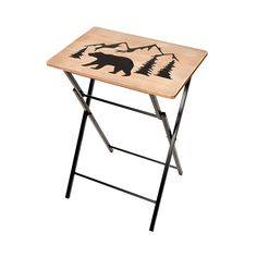 a wooden table with a bear design on it