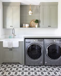 a washer and dryer in a small room