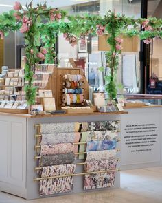 a display in a store filled with lots of fabric