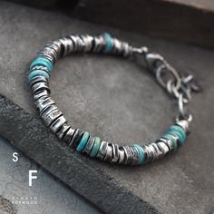 "Bracelet is made of oxidized silver 925 and Turquoise The details diameter is up to 0.28\" (7mm), stones : approx. 0.28\" ( 7mm ) In the pictures you can see the bracelet with Size S/M - Its weight is 16,5g  SIZE : S/M - Total length 8.2 Inches.  Adjustable inside circumference 6.3 - 7.5 inches (Total length 21cm.  Adjustable inside circumference 16-19 cm ) L/XL - Total length 9 Inches.  Adjustable inside circumference 7 - 8.2 inches (Total length 23cm.  Adjustable inside circumference 18-21 cm ) All jewelry designs, pictures and descriptions belong to formood Artur Hornowski/studioformood and are protected by international copyright Thank you for visiting!" Masculine Accessories, Unique Mens Bracelet, Turquoise Jewellery, Viking Knit, Whiskey Bar, Necklace Ideas, Beaded Jewellery, Unusual Jewelry, Unisex Bracelets