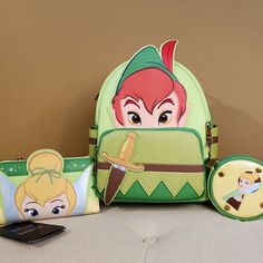 Soar To Your Next Adventure With The Help Of A Friendly Fairy And Yours Truly Peter Pan Himself! Grab This Sold Out Limited Release Set Before Its Gone. Make This The Perfect Gift For That Special Someone... Or Just Treat Yourself! * * * * Features * * * * Sold Out Limited Release Set Backpack 2,250 Piece Release Wallet 1,500 Piece Release Backpack * Height 10.5" * Width 5" * Length 9" * Top Handle 3" Coin Purse Round 3.5" X 3.5" * Width .5" Wallet * Height 4" * Width 1" * Length 6.6" Grab This Tinker Bell Cosplay, Loungefly Purse, Loungefly Bag, Tinker Bell, Cute Sets, Yours Truly, Peter Pan, Green Yellow, Limited Editions