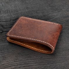 Bifold wallet made of vegetable tanned Buttero (Walpier tannery, Italy) or Pueblo (Badalassi Carlo tannery, Italy) or Minerva (Badalassi Carlo tannery, Italy) leather. Leather thickness is ±1,4mm / 3.5oz Check colors here: https://www.etsy.com/listing/842671392/leather-colors-for-my-listings The wallet measurements are 11x8.5cm / 4.33x3.35in when folded. There are 4 card slots, each holds few cards and slot for paper money ( perfect for US dollars, other currencies up to 80mm height) The edge ha Handmade Bifold Wallet For Formal Occasions, Vegetable-tanned Bifold Wallet For Daily Use, Daily Use Vegetable-tanned Bifold Wallet, Daily Vegetable-tanned Bifold Wallet, Classic Bifold Wallets With Waxed Finish, Handmade Classic Trifold Wallets, Fun Wallets, Paper Money, Leather Bifold Wallet