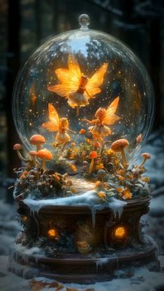 a snow globe filled with fairy figurines and lights