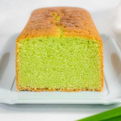 a piece of green cake on a white plate