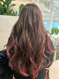 Brown and Pink hair on wavy hair #brown #pink #haircolor #hairgoals #justgirlythings #prettyinpink #wavy #curlyhairstyle #afro Brown Hair Pink Highlights Curly, Pink In Brunette Hair, Pink Hair On Brown Hair, Dark Brown Hair Pink Highlights, Pink Highlights In Brown Curly Hair, Pink Highlights On Brown Hair, Pink Highlights In Dark Brown Hair, Brunette And Pink Hair, Pink Hair Ideas Brunettes