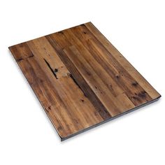 a wooden cutting board on a white background