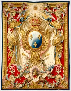 an ornately decorated wall hanging with gold, blue and red decorations on it's sides