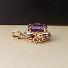 "February's Birthstone! This unique Vintage style Pendant combines Both White & Chocolate color Genuine Diamonds with a halo design around the most perfectly Purple Amethyst. This Genuine Amethyst Center Gemstone is an oval shape, measuring 8X10mm. All stones are set in 14k Rose Gold solid mounting, with a movable 14k Rose Gold bail. **Amethyst is an official February Birthstone. Please feel free to contact me anytime, if you have any questions or need any additional information. All items a Halo Design, Halo Pendant, Chocolate Color, February Birthstone, Amethyst Pendant, February Birth Stone, Diamond Halo, Amethyst Ring, Purple Amethyst