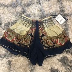 Nwt!! Free People Printed Skort. Hard To Find. Excellent Condition. No Flaws. Elastic Waist. Clean, Smoke Free Home Blue Bohemian Shorts For Spring, Bohemian Blue Shorts For Spring, Bohemian Blue Shorts With Elastic Waistband, Bohemian Style Cream Bottoms With Elastic Waistband, Flowy Multicolor Skort, Bohemian Fitted Mini Skort, Hippie Multicolor Shorts, Bohemian Beach Skort (skirt Shorts), Multicolor Hippie Shorts