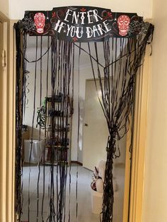 an entry way decorated with vines and decorations for valentine's day or other special occasion