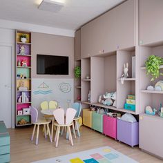 a child's playroom with toys and furniture