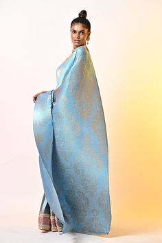 Metallic powder blue pleated saree with abstract print and hand embroidery. Comes with an unstitched blouse.
Components: 2
Pattern: Printed, Hand embroidered
Type Of Work: Abstract
Fabric: Pleated polyester mix
Color: Blue
Other Details: 
Note : Stitched blouse worn by the model is not for sale.
Occasion: Mehendi and Haldi,Sangeet - Aza Fashions Blue Pre-draped Saree For Festive Evenings, Blue Bollywood Blouse For Formal Occasions, Blue Bollywood Formal Blouse Piece, Blue Bollywood Style Formal Blouse Piece, Traditional Blue Blouse Piece For Evening, Traditional Drape Blue Blouse Piece For Evening, Blue Traditional Drape Blouse For Evening, Traditional Blue Pre-draped Saree For Evening, Festive Floor-length Blue Pre-draped Saree