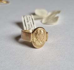 "Unique solid gold cameo Victorian signet ring in an oval design, statement pinky ring, antique style jewelry for women, available in 9k and 14k yellow gold.  This handmade gold ring is elegant and has a vintage style look. It was made by duplicating an old cameo earring, casting it into gold, and attaching it to the top of a wide band. It is available in 9k or 14k yellow gold.  This Cameo ring is a great ring for everyday wear that will compliment each of your fingers, including the pinky :) It has a unique statement and will never go out of style.  Get this timeless solid gold signet ring- you'll never want to take it off :).  Item details: 1 solid gold ring. Dimensions: Signet ring top: 0.7\"X0.4\" (1.7 cmX1.2cm) Band thickness: 0.039\" (1mm) Band width: 0.2\"  (5mm) Materials: 9k yello Silver Wedding Rings Men, Cameo Earring, Simple Ring Band, Antique Style Jewelry, Oval Signet Ring, Antique Gold Rings, Pinky Signet Ring, Unique Gold Rings, Gold Pinky Ring