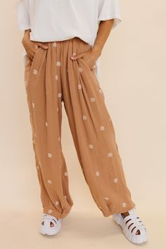 THE EVALYN EMBROIDERED DAISY PANTS IN LATTE Luxury Floral Embroidered Women's Pants, Luxury Floral Embroidered Pants For Spring, Cheap Embroidered Straight Leg Bottoms, Luxury Casual Pants With Floral Embroidery, Boho Pants Name, Luxury Bohemian Bottoms With Floral Embroidery, Luxury Embroidered Casual Pants, 40s Womens Pants Embroidered, Cheap Embroidered Cotton Bottoms