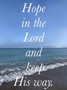 a beach with the words hope in the lord and keep his way written on it