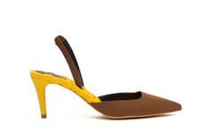 Our elegant Gabriella 75mm heeled pointed-toe slingback is just the perfect option to wear with everything. The pointed toes give a timeless elevated touch, while our practical slingback ensures a secure fit. Our signature cushioned insole ensures a more comfortable fit and a unique silhouette. Artisanally made in Italy. Item Details Heel measures approximately 75mm / 3 inches Color: Mustard Satin Outer: 63% cotton, 37% nylon Sole: 50% synthetic rubber, 40% mineral composts, 10% additives Lining Life Cycle Assessment, Sustainable Shoes, Veneto Italy, Luxury Footwear, Yellow Satin, Brown Satin, Synthetic Rubber, Slingback Pump, Yellow And Brown