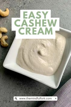 cashew cream in a white bowl with cashews around it and the words easy cashew cream