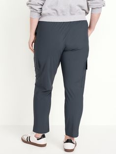 elastic waist front pockets flap-cargo pockets pull-on style go-dry wicks moisture four-way stretch breathable sits at belly button loose hip and thigh tapered leg 27" regular inseam 25" petite inseam 30" tall inseam models are approx.  5'9" and wear sizes s (4), l (12), and xl (18)machine wash according to the care instruction label Stretch Utility Cargo Pants For Sports, Stretch Utility Activewear With Pockets, Stretch Athleisure Cargo Pants With Functional Pockets, Stretch Cargo Pants With Functional Pockets For Sports, Functional Stretch Cargo Pants With Tapered Leg, Functional Stretch Bottoms With Cargo Pockets, Outdoor Stretch Bottoms With Side Pockets, Stretch Bottoms With Side Pockets For Outdoor Activities, Comfort Stretch Outdoor Bottoms With Pockets