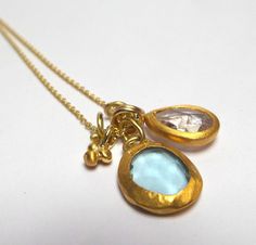 Blue Topaz Pendant - Beautiful Blue Topaz stone inlaid in 24K solid gold. Rutilated Quartz pendant inlaid in 24K solid gold, 24k gold dots. The Blue Topaz  pendant length 15mm. The Blue Topaz and Rutilated Quartz pendants  in 14k solid gold Chain length 45cm - 560$. The Blue Topaz and Rutilated Quartz pendants  in oxidized sterling silver chain 50cm - 360$. Please let me know how do your necklace. Free Shipping The pendant will be packed in a Beautiful gift box. Your necklace will be shipped to Gold Faceted Blue Topaz Necklaces, Gold Necklace With Faceted Blue Topaz, Gold Blue Topaz Teardrop Pendant, Gold Blue Topaz Pendant Jewelry, Luxury Gold Necklace With Blue Topaz, Handmade Gold Necklaces With Blue Topaz, Gold Necklace With Blue Topaz Birthstone, Gold Blue Topaz Necklace For Anniversary, Gold Blue Topaz Jewelry For Jewelry Making