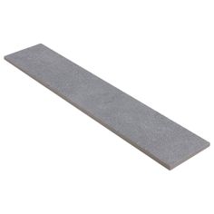 a long gray concrete block on a white background