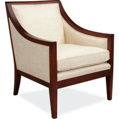 the arm chair is made from wood and has beige upholstered fabric on it