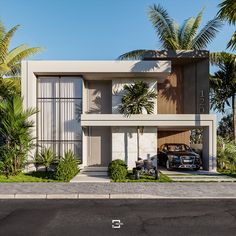 a car is parked in front of a modern house with palm trees and shrubs around it