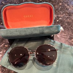 New Gucci Glasses. Comes With Bag And Glasses Box Elegant Round Frame Formal Sunglasses, Elegant Formal Round Frame Sunglasses, Luxury Formal Sunglasses With Round Frame, Luxury Round Frame Sunglasses For Formal Occasions, Luxury Round Sunglasses With Mirrored Lenses, Gucci Brown Sunglasses For Party, Luxury Round Sunglasses With Gradient Lenses, Brown Gucci Sunglasses For Party, Elegant Round Sunglasses With Mirrored Lenses