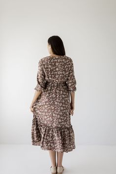 For all the stylish mamas, this midi dress is for you! The 'Ashley' floral midi nursing dress now features a quarter sleeve, and still carries the same comfort and grace as the original. Pair with low ankle boots and a shoulder bag for a simple and charming autumn ensemble! Exclusively designed by us with you in mind. 100% Polyester Hand Wash Cold Do Not Bleach Hang to Dry Low Iron if Needed Do Not Dry Clean Fully Lined Nursing friendly hidden zipper Maternity/Bump Friendly! Model height 5'7" | Modest Flowy Floral Print Midi Dress, Casual Floral Print Maxi Dress With 3/4 Sleeve, Casual Maxi Dress With Floral Print And 3/4 Sleeve, Flowy Modest Maternity Maxi Dress, Flowy Half Sleeve Floral Print Dresses, Daywear Dresses With Floral Print And 3/4 Sleeves, 3/4 Sleeve Floral Midi Dress For Daywear, Floral Print Midi Dress With 3/4 Sleeves For Daywear, Modest Maternity Summer Dress