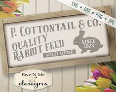 a wooden sign that says p cottontail & co quality rabbit feed sold here