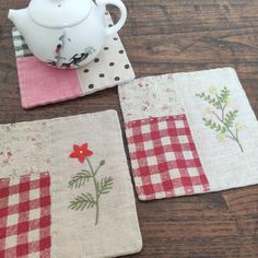 three coasters with red and white checkered fabric, one has a teapot on top