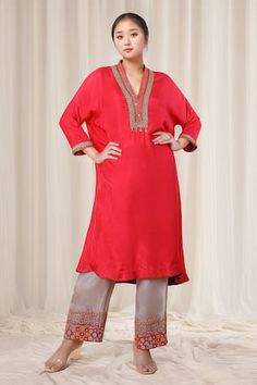 Light red kaftan style kurta with mirror, thread and sequins embroidered neckline and cuffs. Comes with pant. - Aza Fashions Bollywood Style Kurta With Embroidered Neckline For Diwali, Red Embroidered Palazzo Set For Diwali, Red Palazzo Set With Straight Kurta And Embroidered Border, Red Palazzo Set With Embroidered Border And Straight Kurta, Bollywood Style Kurta With Embroidered Neckline For Eid, Diwali Traditional Wear Straight Kurta With Embroidered Neckline, Festive Bollywood Salwar Kameez With Embroidered Neckline, Traditional Kurta With Embroidered Neckline For Diwali, Red Straight Kurta With Mirror Work