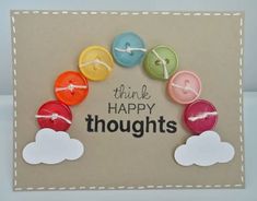 a card with buttons and the words think happy thoughts