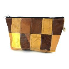 a brown and yellow patchwork leather pouch