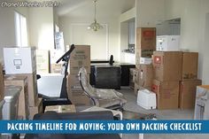 a living room filled with boxes and furniture