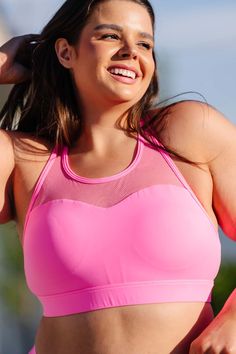 Your cries have been heard! The beloved sweetheart bra is now a swim item, and it's even better than before. With a thicker supportive band, this swim top can double as a gym and beach companion. Say goodbye to unsupported workouts and vacations, and hello to an adorable sweetheart neckline that flatters all body shapes. It's a must-have for your summer wardrobe. Pink Swimwear With Medium Bust Support For Summer, Athleisure Swimwear With Removable Bra Pads, Sports Tankini With Removable Bra Pads, Sports Tankini With Stretch And Removable Bra Pads, Sports Swimwear With Medium Bust Support In Nylon, Sports Swimwear With Medium Bust Support, Summer Workout Sports Bra With Padded Cups, Beach Swimwear With Medium Bust Support, Pink Full Coverage Swimwear With Built-in Bra