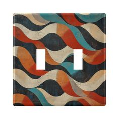 an artisticly designed light switch plate cover with wavy waves on the front and sides