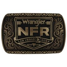 Stand out in a crowd with the 2024 National Finals Rodeo Square Belt Buckle. This buckle features the NFR Pro Rodeo crest with gold letters set in a black back drop for added contrast. Gold tone filigree frame the gold finished NFR Pro Rodeo crest. A southwestern pattern lines the top and bottom border of the buckle. Each buckle has a 1.5 inch back swivel. All Montana Silversmiths jewelry and accessories are coated with Montana Armor to prevent tarnish. The buckle features a 1.5 inch swivel to fit with most standard belts. Turn heads with stunning filigree. Enjoy the beauty of a gold finish. Montana Silversmith Jewelry, Rodeo Belt Buckles, National Finals Rodeo, Rodeo Jewelry, Southwestern Patterns, Gold Letters, Letter Set, Suspender Belt, Horse Tack