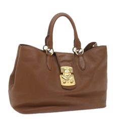 Brand : Miu Miu Color : Brown Material : Leather Size(Cm) : W36cm X H26cm X D16cm(Approx) Size(Inch) : W14.2 X H10.2 X D6.3inch(Approx) Style : Hand Bag Accessory : There Is No Item Box And Dust Bag. We Will Send Only The Item Which Is Put In The Photo. Product No. : - Serial No. : 122 Made In : Italy Rank : C Sku : Yk9307 Condition : Outside : Surface : Rubbing Handle : Rubbing Metal Fittings : Scratches Inside : Rubbing , Slight Stain Pocket : Rubbing , Partly Stain Corners : Rubbing Odor : There Is Keeping(Storage) Smell. Other Remarks : - Classic Miu Miu Bags For Everyday, Formal Miu Miu Shoulder Bag, Elegant Miu Miu Formal Bags, Miu Miu Rectangular Travel Bags, Luxury Miu Miu Satchel Bag, Miu Miu Designer Top Handle Bag, Designer Miu Miu Top Handle Bags, Miu Miu Formal Bag With Detachable Handle, Elegant Miu Miu Shoulder Bag For Travel