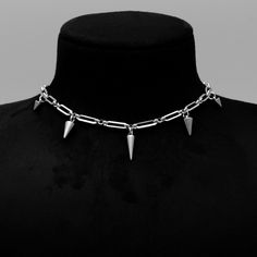 Spiky gothic style paperclip choker necklace in silver Silver Chain Choker Necklace, Silver Punk Style Jewelry Chain, Silver Punk Jewelry With Chain, Punk Style Silver Chain Jewelry, Silver Punk Style Chain Necklace Gift, Silver Punk Chain Necklace Gift, Silver Punk Chain Necklace For Gift, Edgy Silver Chain Necklace With Lobster Clasp, Edgy Silver Link Jewelry