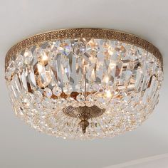 a crystal chandelier hanging from the ceiling