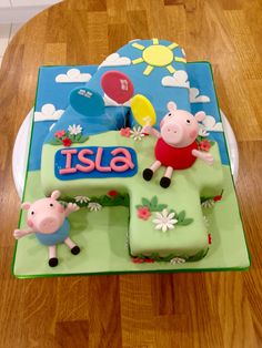 a birthday cake with pep the pig on it